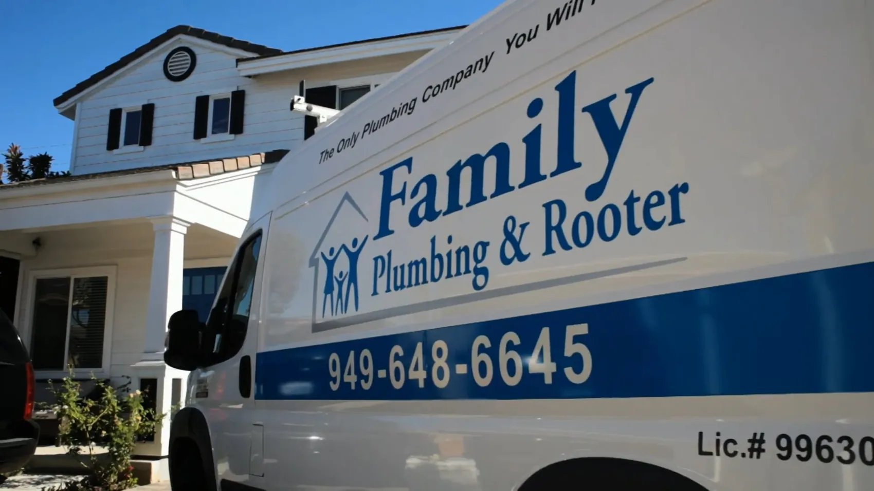 A Family Plumbing & Rooter service van parked outside a customer&rsquo;s home.